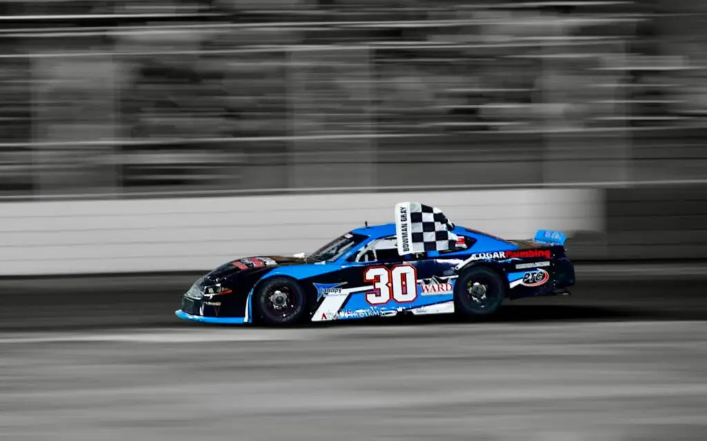 Blue race car on track