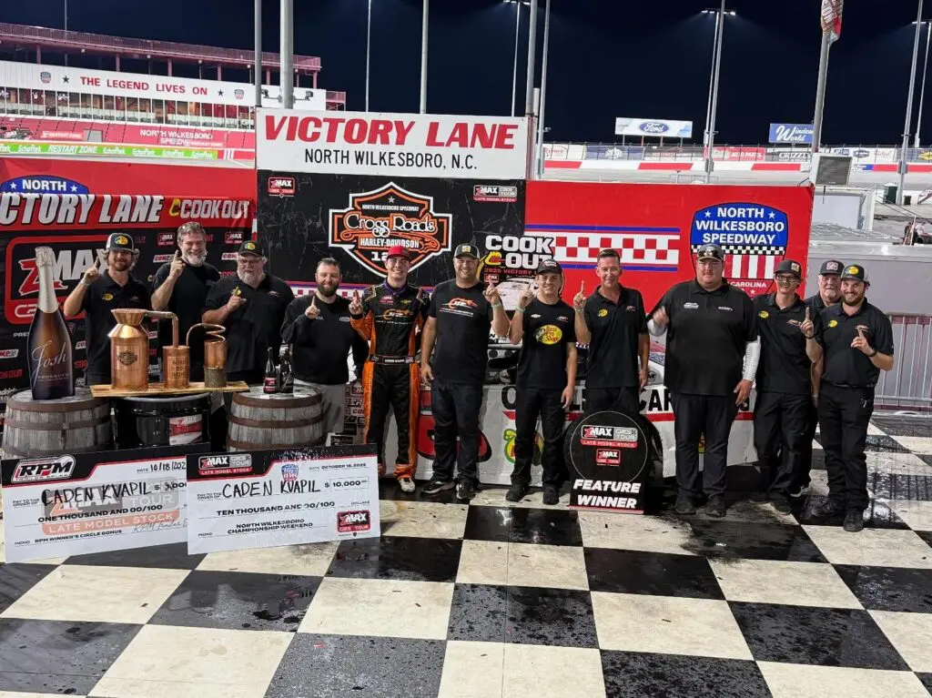 Racing team in victory lane celebration