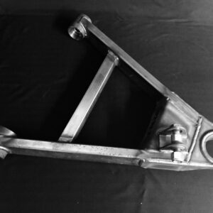 A black and white photo of an old motorcycle frame.