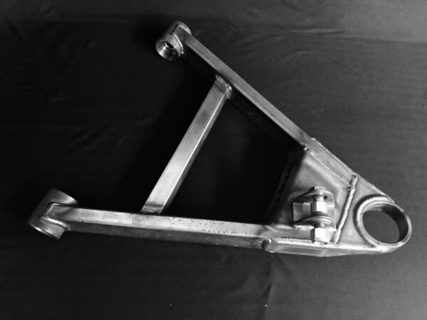 A black and white photo of an old motorcycle frame.