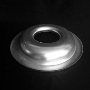 A metal object sitting on top of a table.