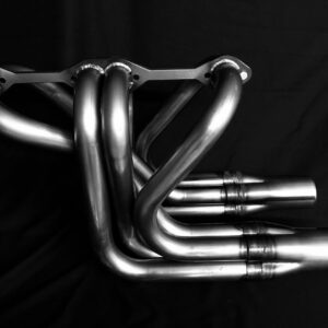 A close up of the exhaust pipes on a car.