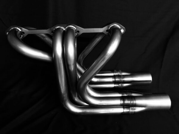 A close up of the exhaust pipes on a car.