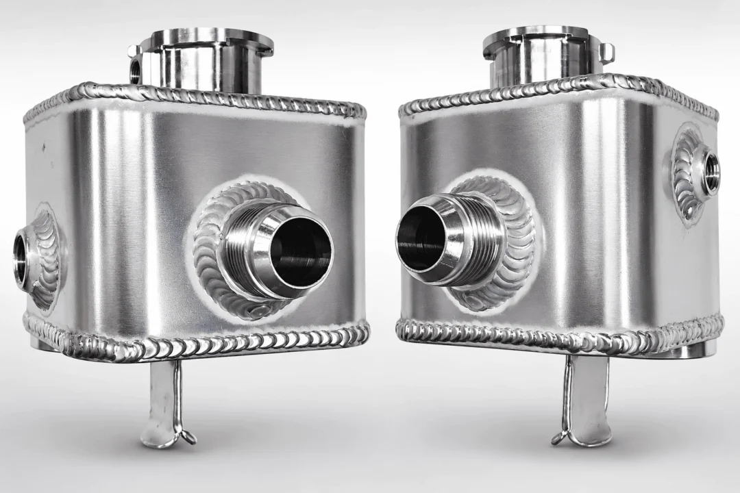 Pair of stainless steel flasks on a white background
