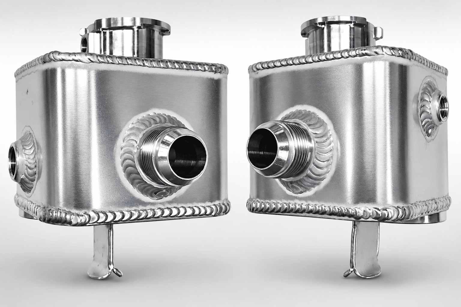 Pair of stainless steel flasks on a white background