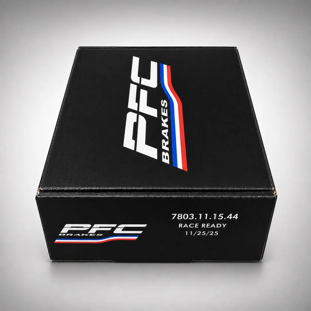 Black box with the words "PFC Brakes" printed on it, sitting on a white surface
