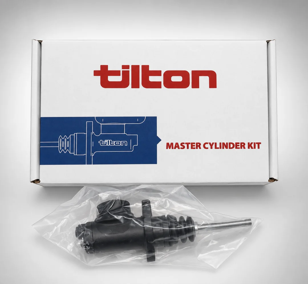 White box with the text "Tilton Master Cylinder Kit" printed on it, containing a black object in a cover