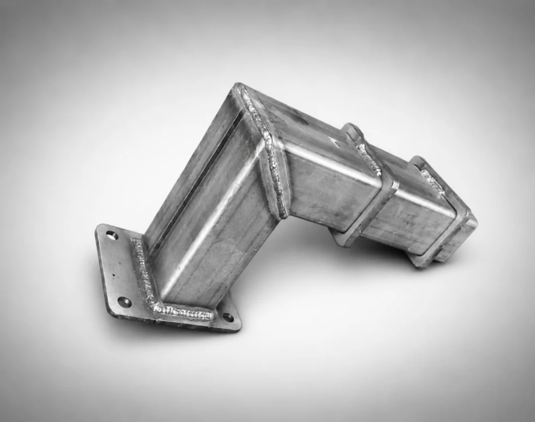Close up of a metal pipe on a white background