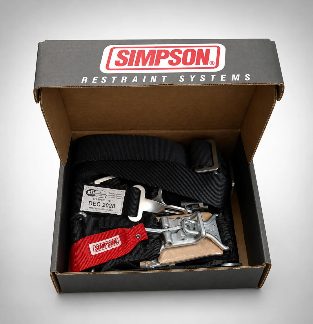 Restraint system box with a red belt and a pair of safety belts inside