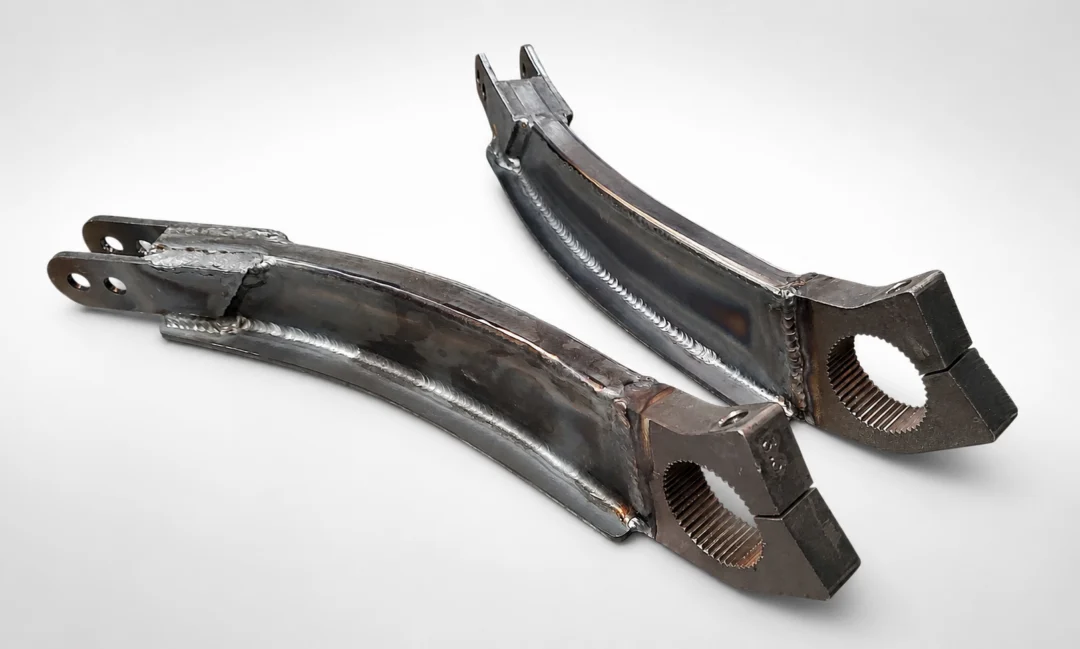 Pair of metal brackets on a white background